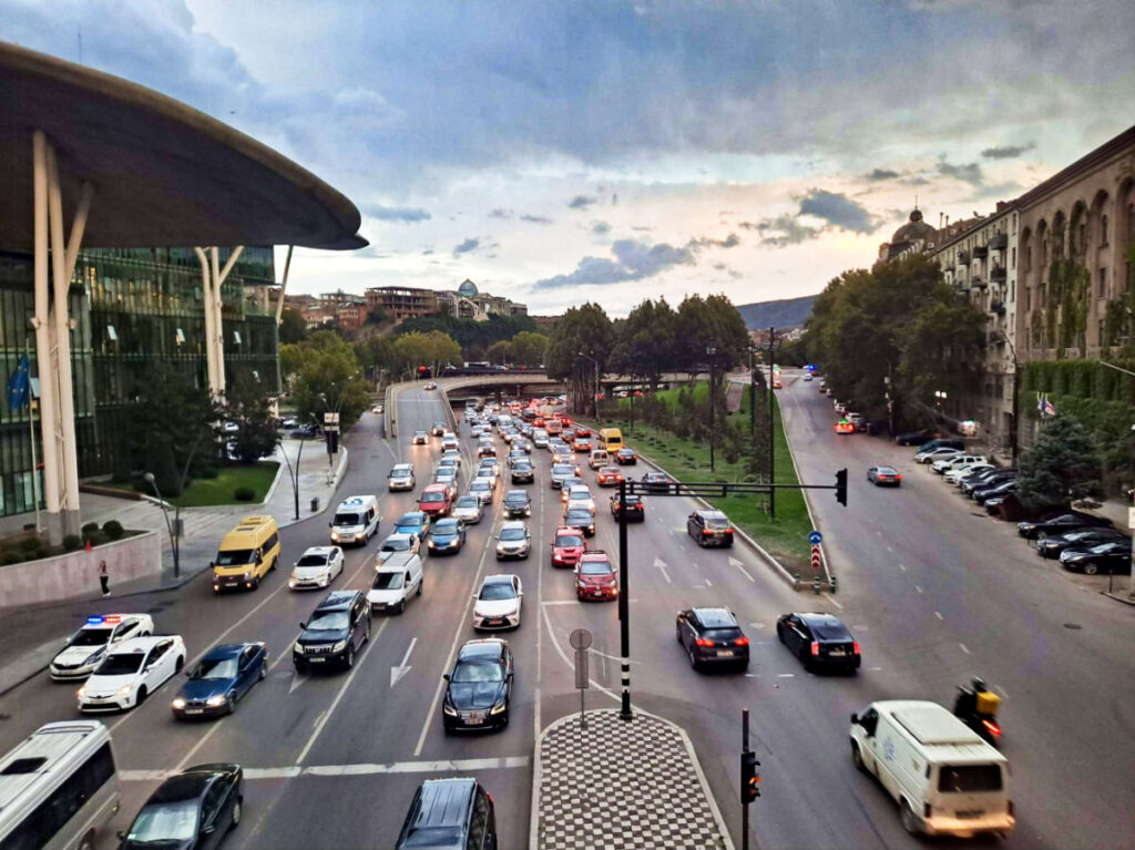 Overlooking view of the vehicles on the streets of Tbilisi near the City Hall building