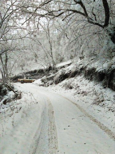 View of the snow covered road on the mountain in Tbilisi during winter