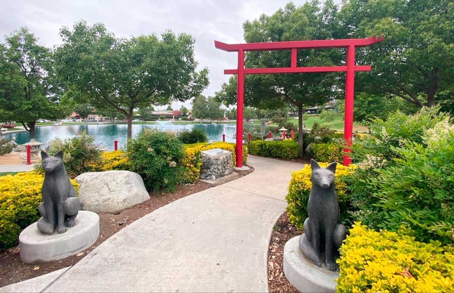 View of a beautiful garden with statue in Temecula Duck Pond & Park