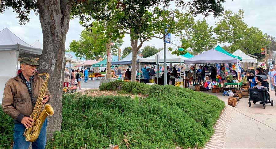 An old man playing his saxophone in Temecula Farmer’s Market