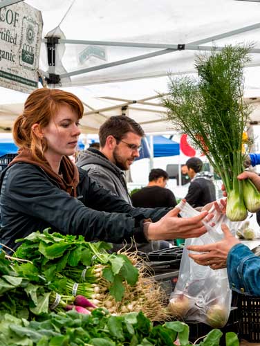 View of people in the Temescal Farmers Market