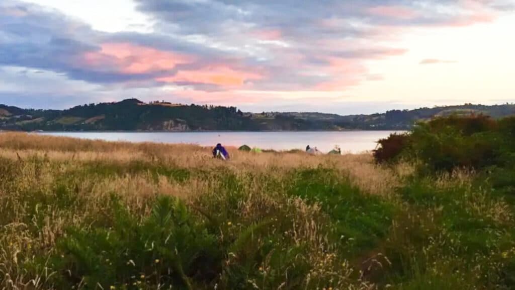 A camping tent on Chiloé Island at sunset