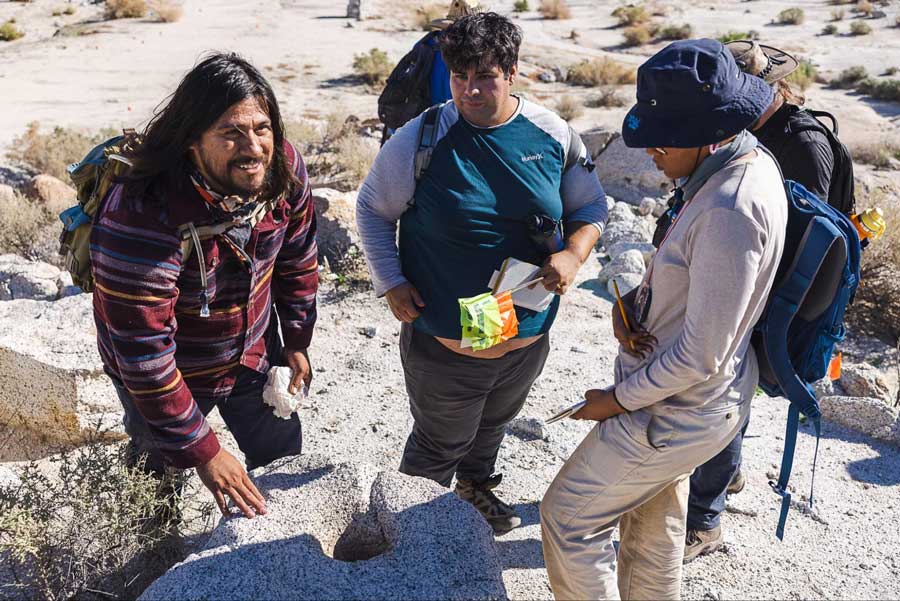 The author's friends looking at the bedrock mortar in Anza Borrego State Park