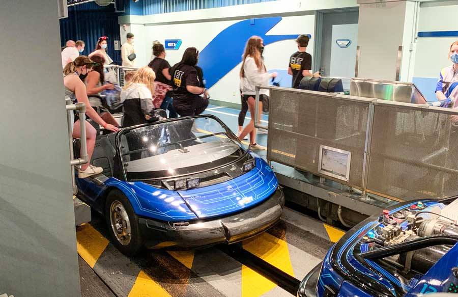 View of people and small cars in Test Track