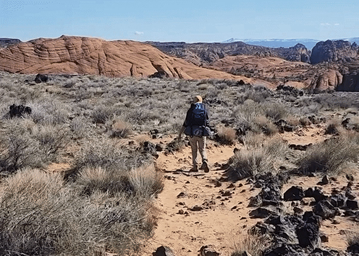 The author, Abigail hiking with the Teton Sports Scout Backpack in Utah