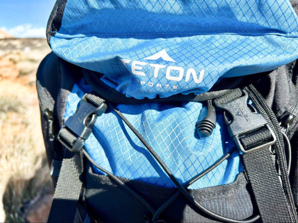 Closeup view of the Teton Sports logo on the front face of the backpack