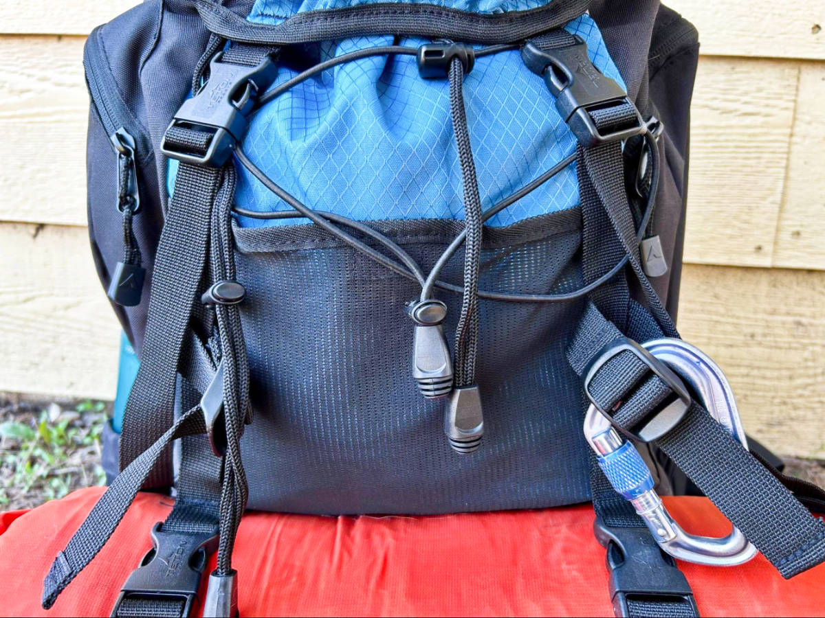 Drawstring feature on the front face of the backpack