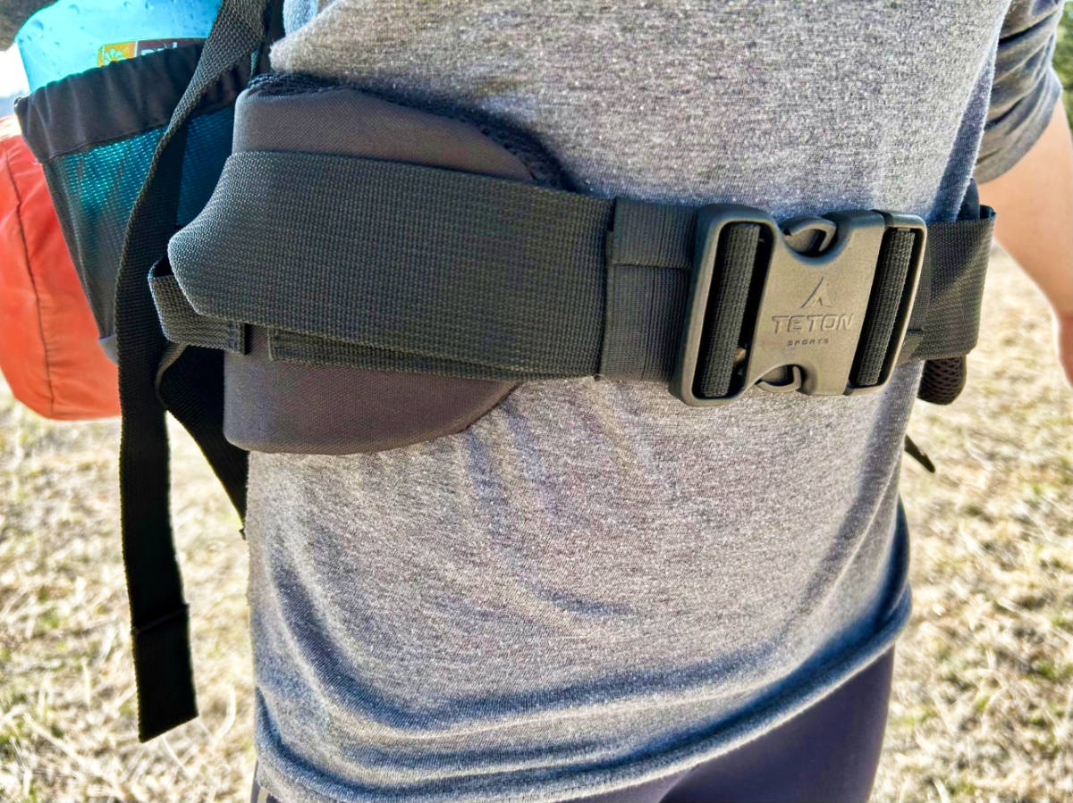 Closeup view of the hip buckle of the Teton Sports Scout Backpack