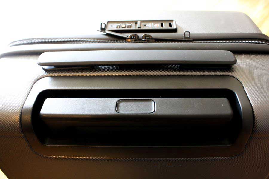 Close up view of the handle of a Textured Carry On