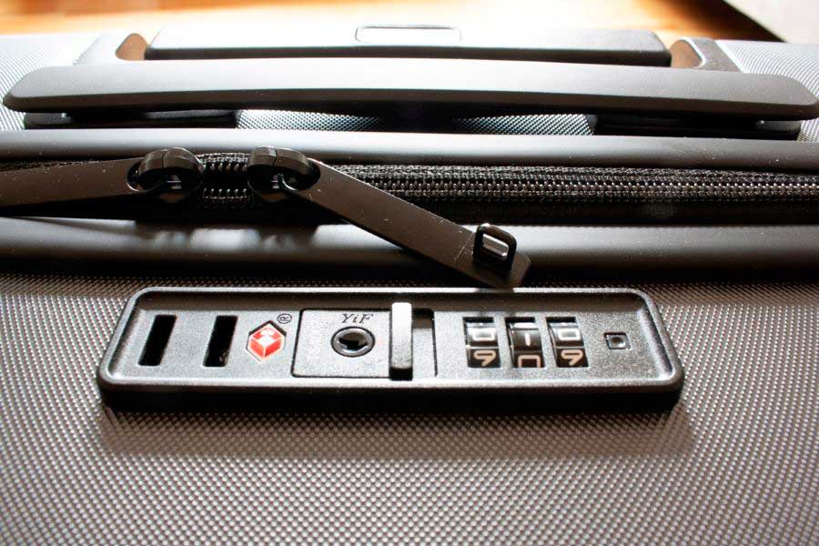 Close up view of the locking system of a Textured Carry On
