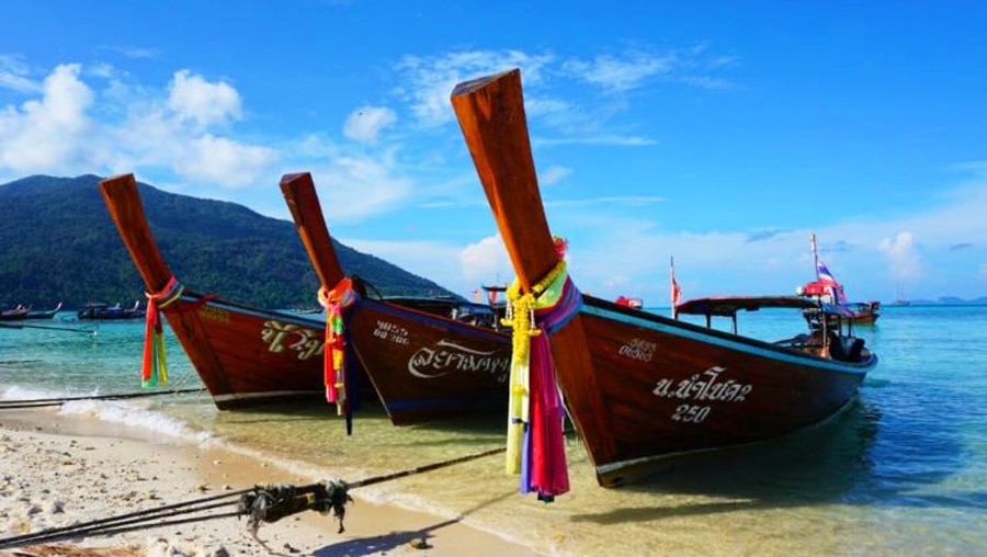 View of boats on the shore in Thailand