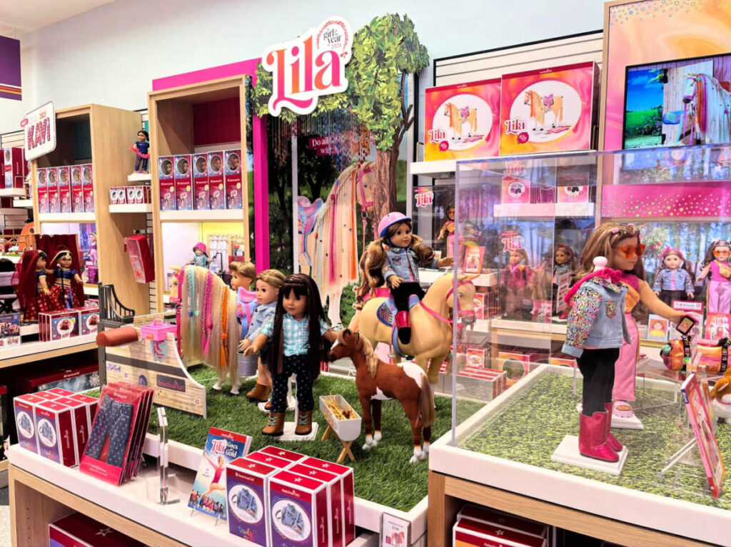 View of the variety of dolls displayed inside The American Girl Store