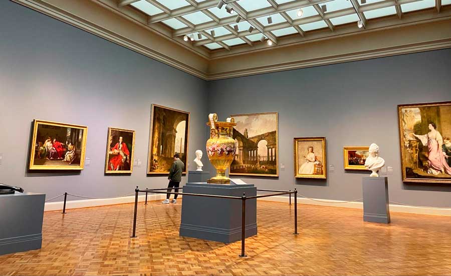 Paintings and sculptures of different artists inside The Art Institute of Chicago