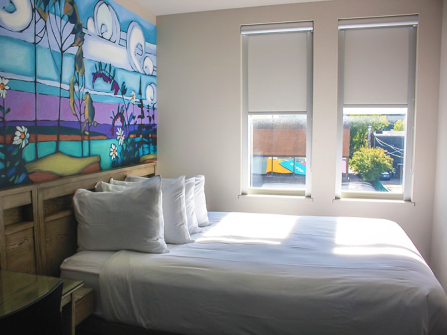 View of the bed in The Arts Hotel