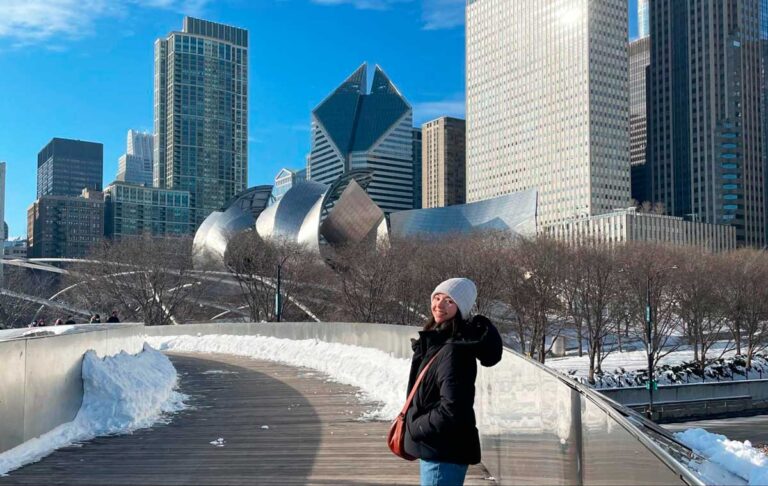 Author Lea Rose standing at The BP Pedestrian Bridge
