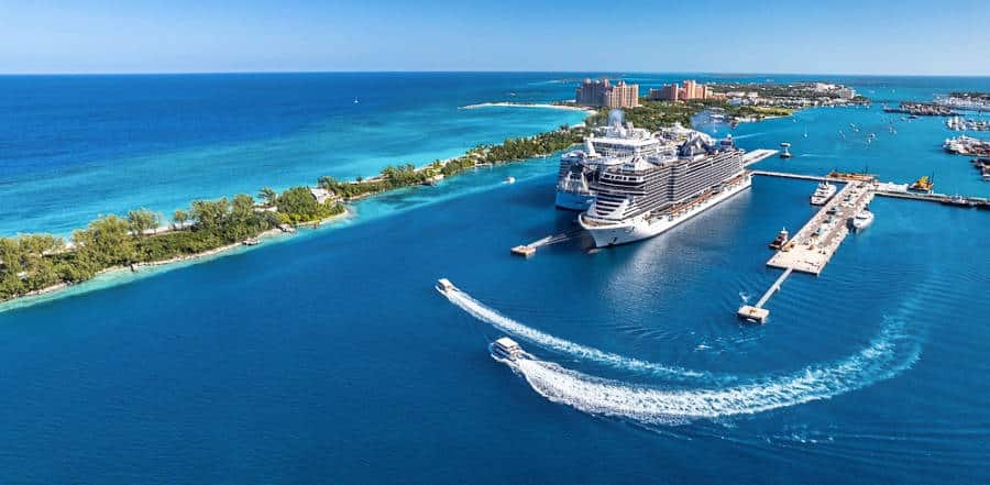 Aerial view of a cruise ship in the clear blue ocean docked in the port of Bahamas