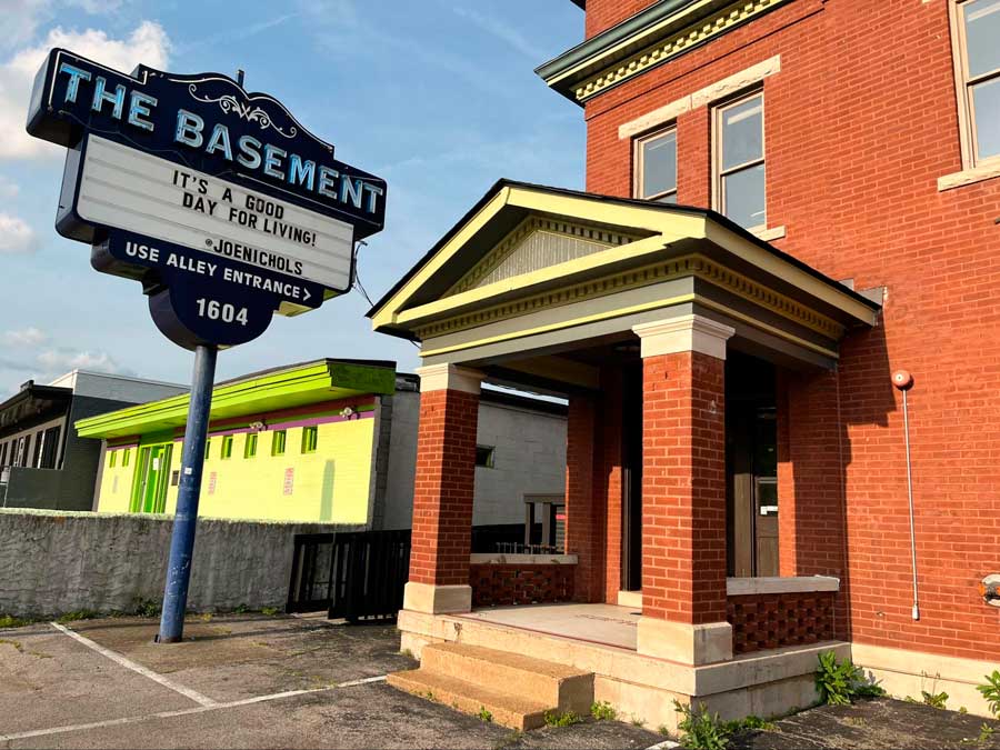 The Basement sign and its entrance from the outside