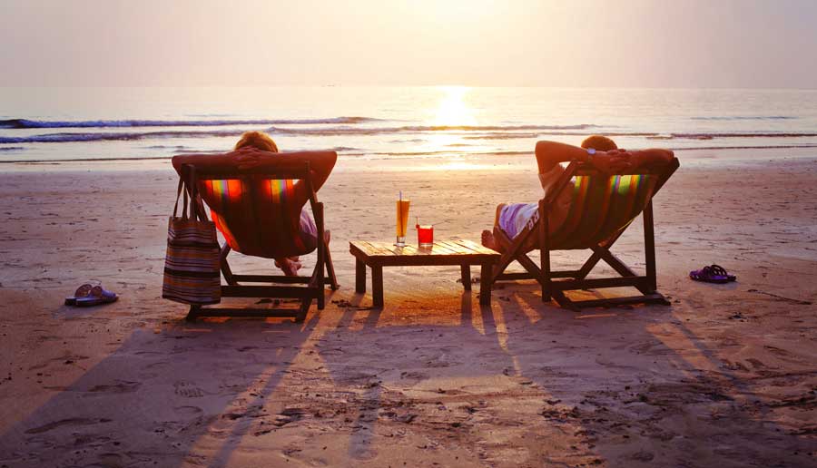 View of two people relaxing on a beach in Oceanside