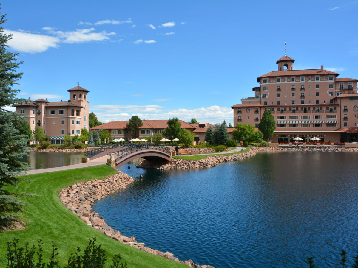 View of a serene lake near The Broadmoor Hotel