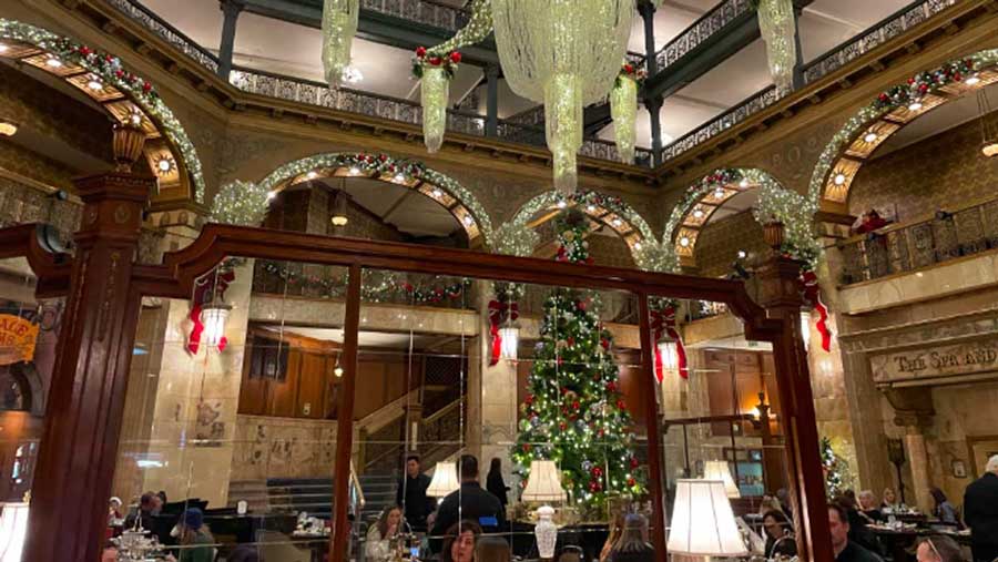 People inside The Brown Palace during Christmas season