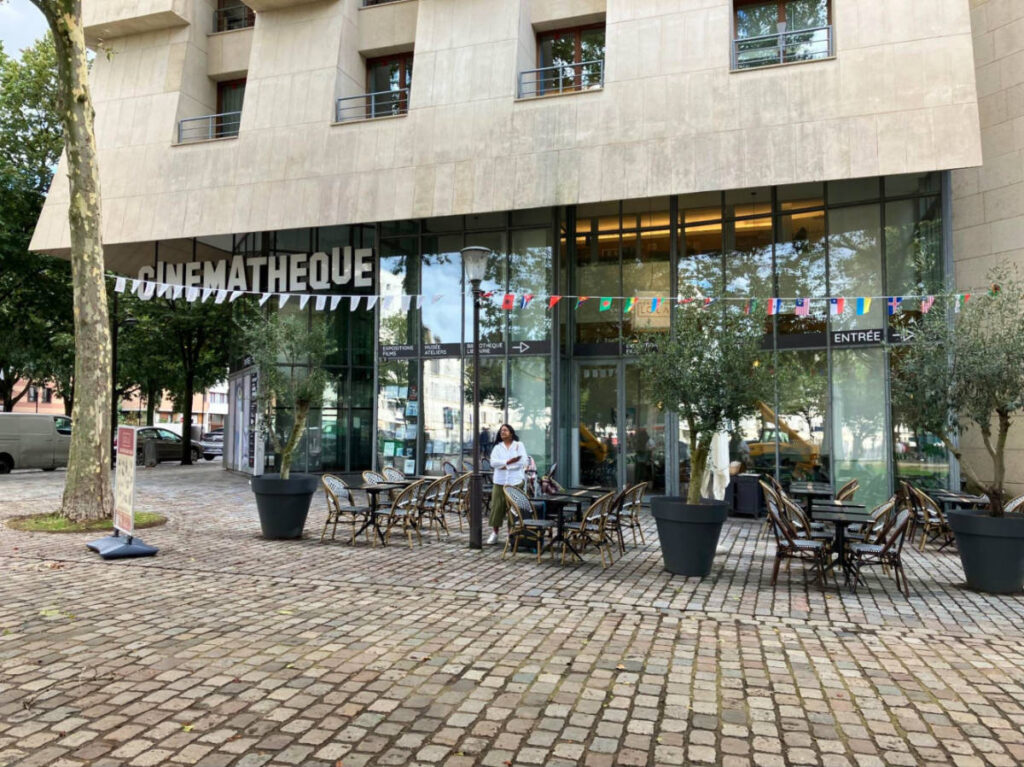 A person waiting outside the Cinémathèque Française