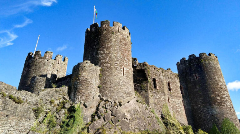 Exterior view of the Conwy Castle with the clear blue sky in the background