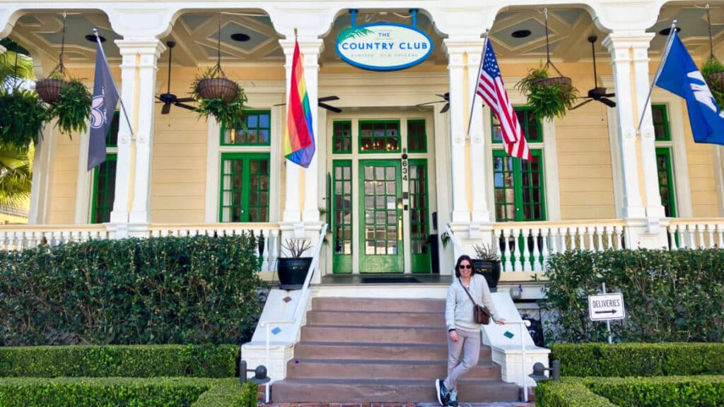 The author Meg O'Connor posing outside  near the staircase to The Country Club entrance