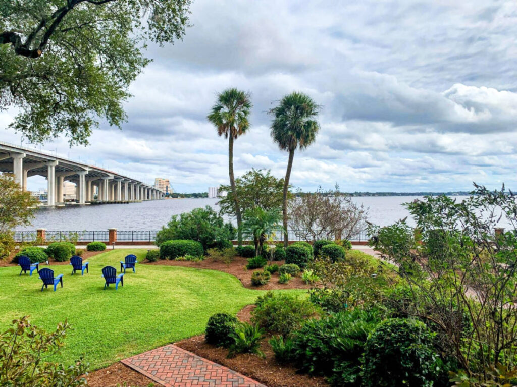 View of the bridge and lush surroundings of The Cummer Museum of Art and Gardens