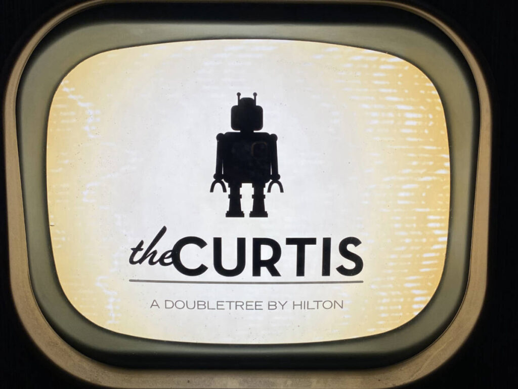 A robot display with the name of The Curtis Hotel in Denver