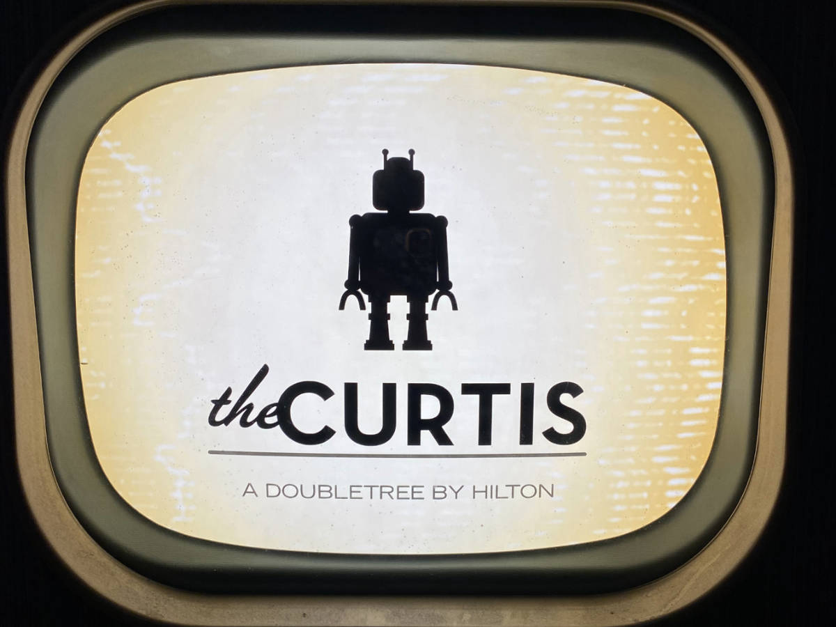 A robot display with the name of The Curtis Hotel in Denver