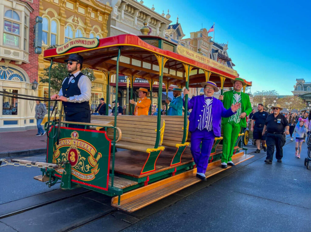 The Dapper Dans: well-dressed men entertaining crowds at Magic Kingdom