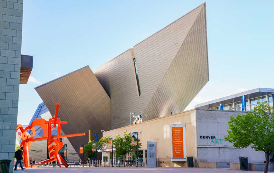 The Denver Art Museum from the outside under the clear blue sky