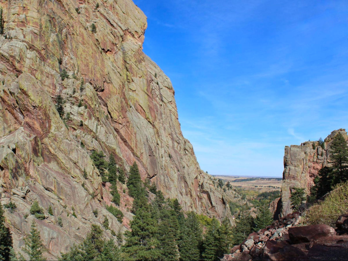 Towering sandstone cliffs in Eldorado Canyon State Park