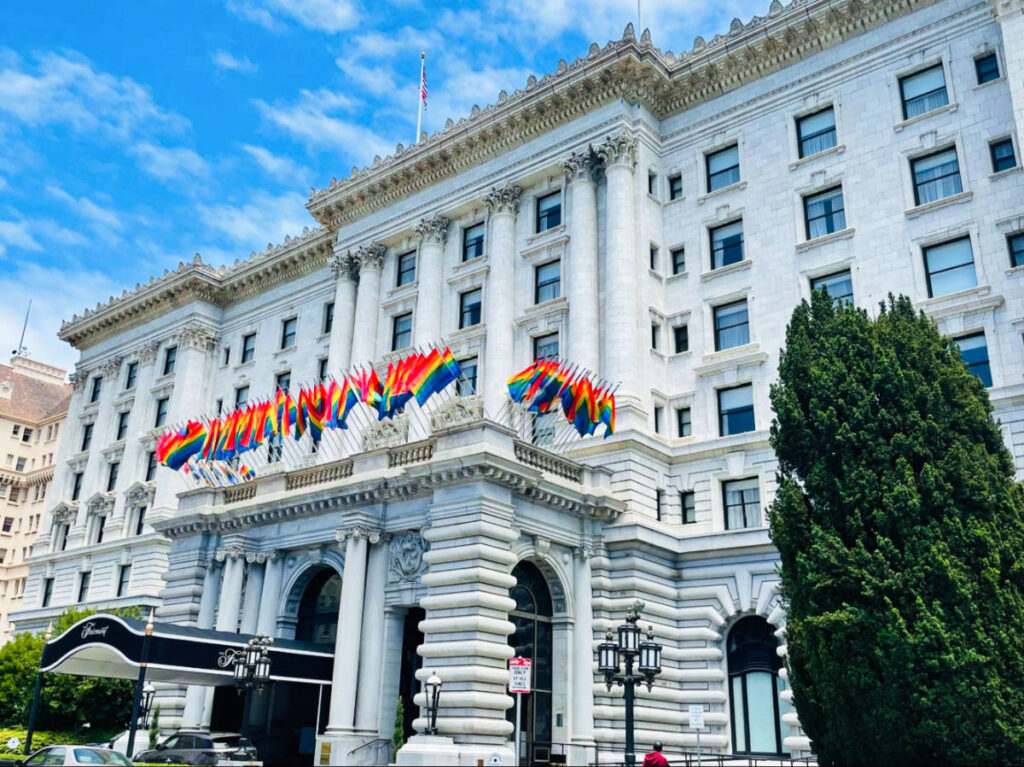 Exterior view of The Fairmont San Francisco with Pride flags around