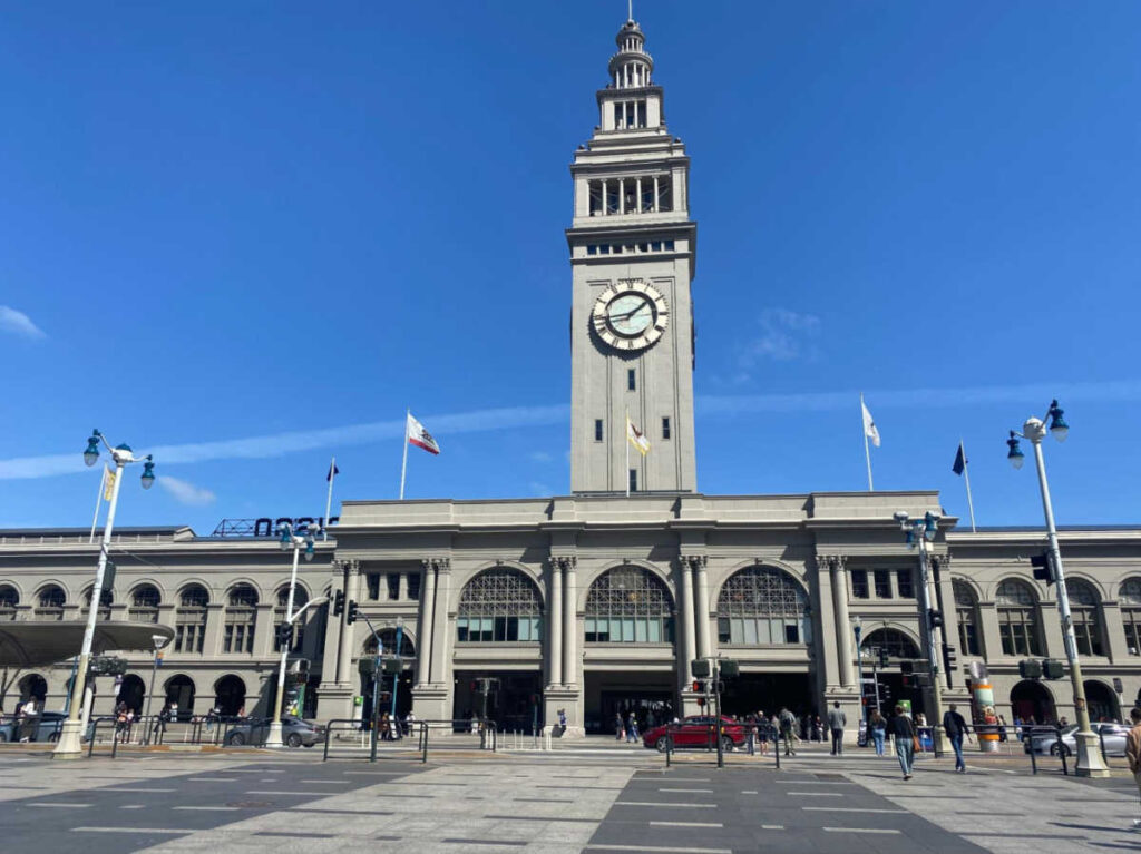 Exterior view of the Ferry Building with a clear blue sky in the background