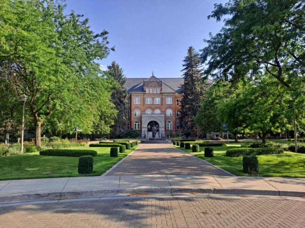 A large building at Gonzaga University, surrounded by lush trees