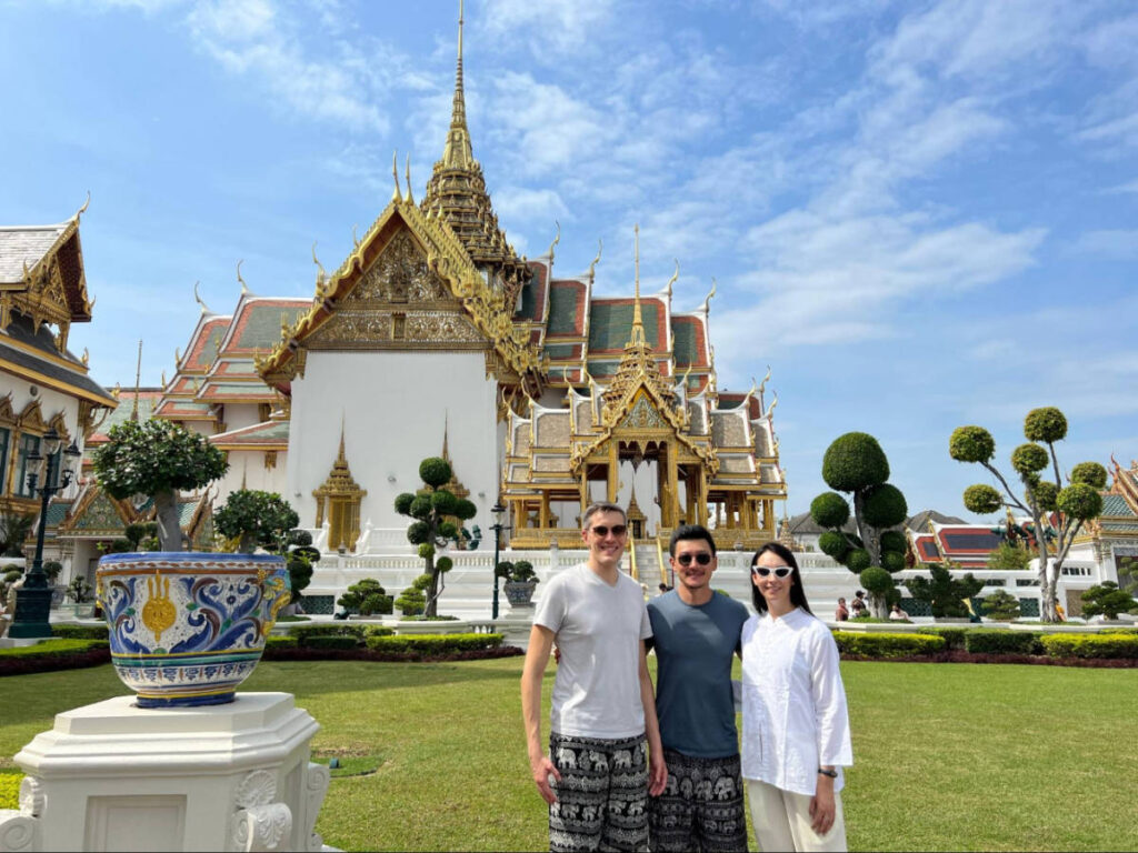 Travel Lemming's Founder Nate Hake with his partner Clara and their friend at The Grand Palace