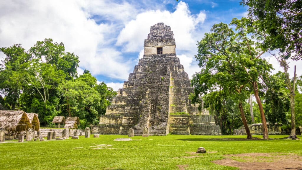 View of The Great Jaguar Pyramid surrounded by greenery in Tikal National Park