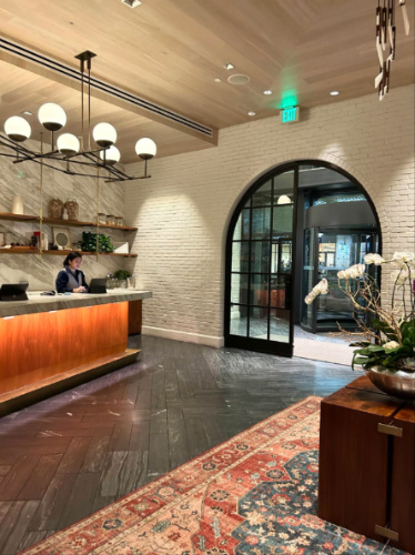 Hotel lobby with spacious reception area and modern decor