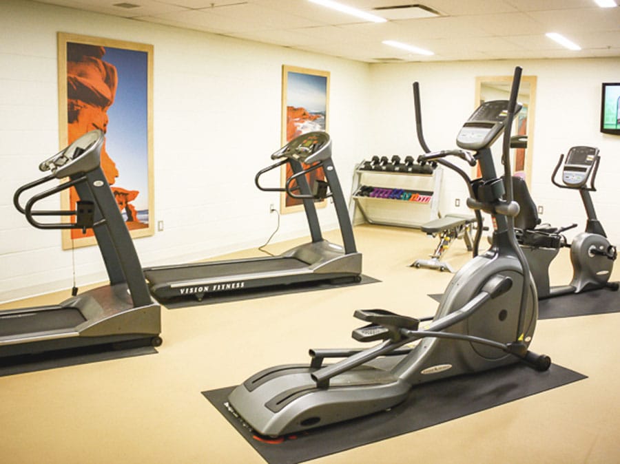 View of gym equipment in The Holman Grand Hotel