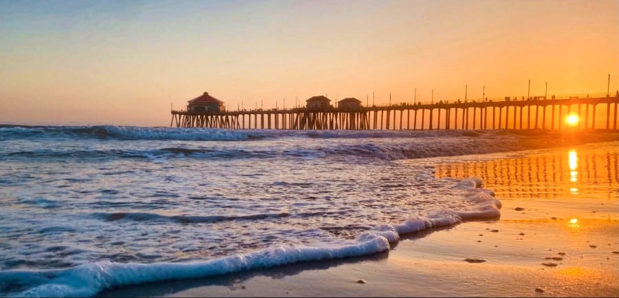 View of The Huntington Beach Pier from a distance at sunset