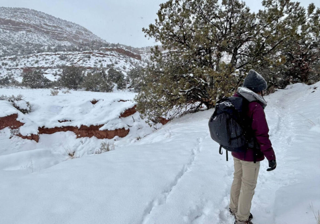 The Hyperlite 3400 Southwest Backpack on Abigail during a winter hike