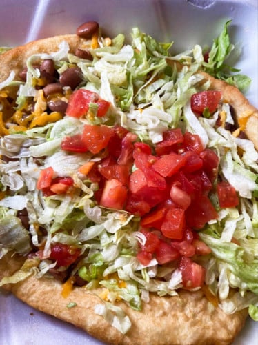 A closeup look at the “Indian Fry Bread” topped with vegetables