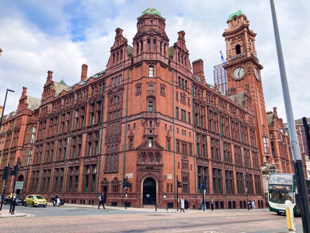 Exterior view of the magnificent structure of The Kimpton Clocktower Hotel