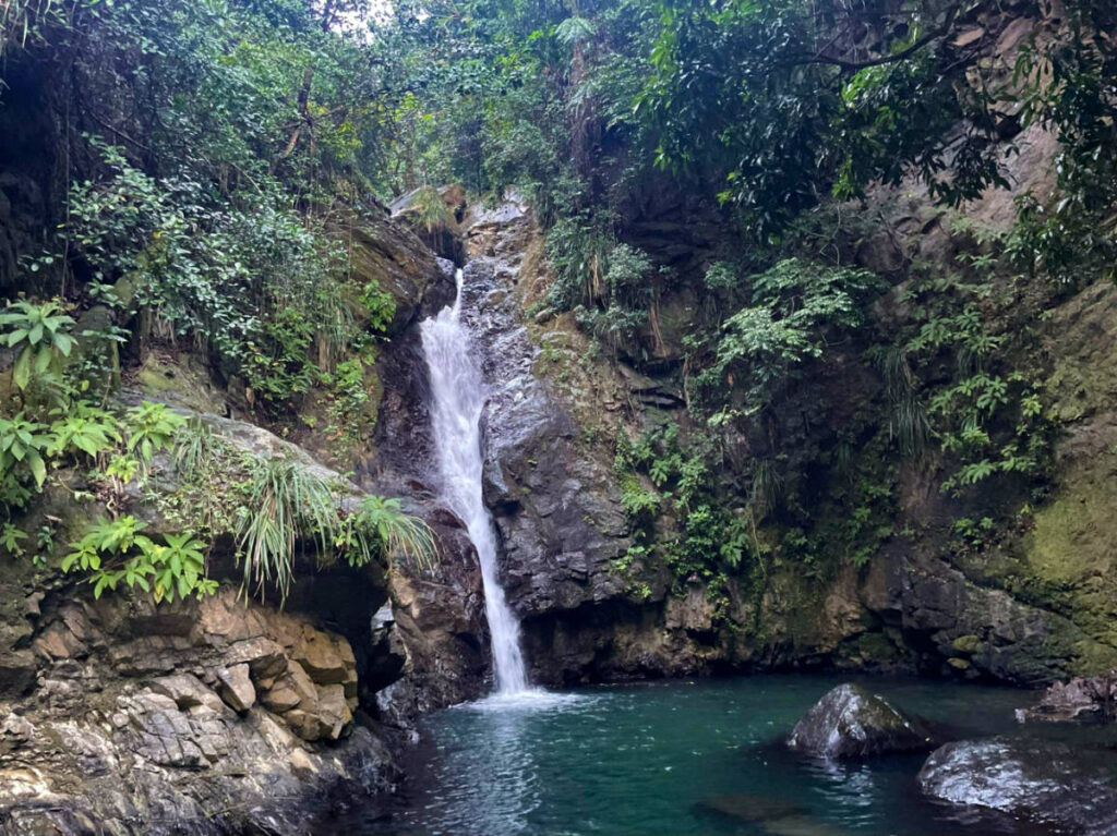 Picturesque view of La Soplaera waterfall in Peñuelas