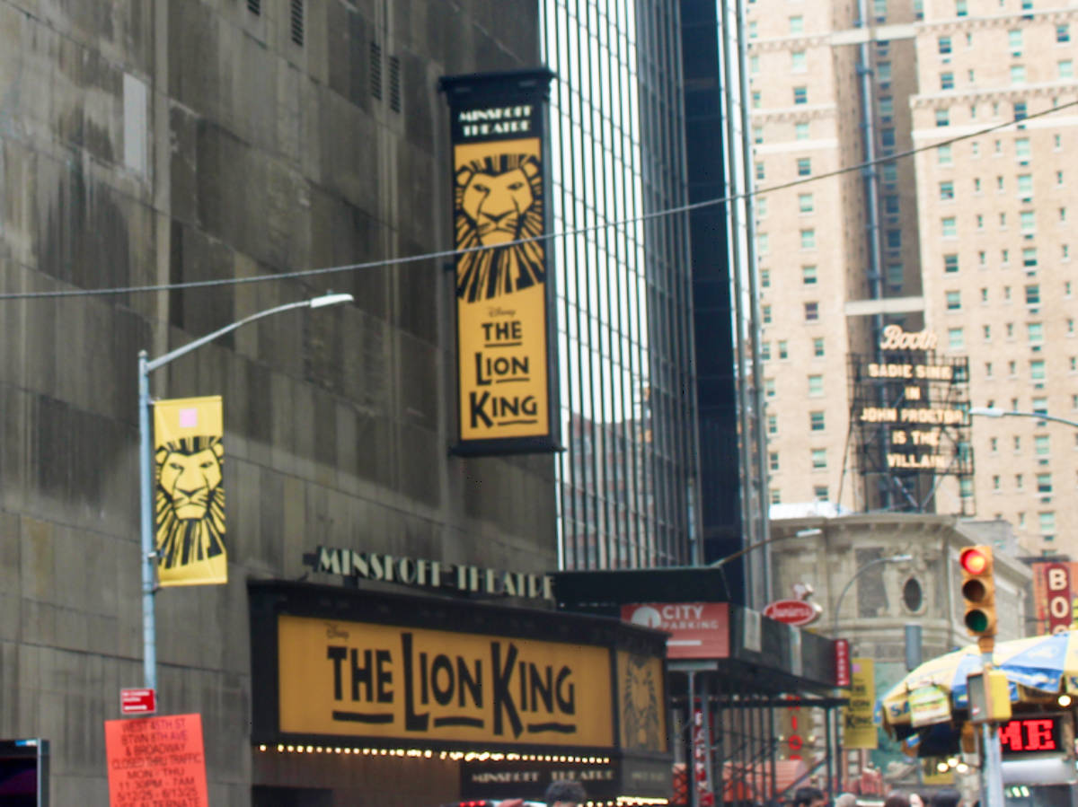 View of the The Lion King posters and signages outside a ticket booth