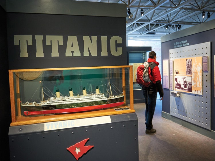 Titanic ship and man looking at picture