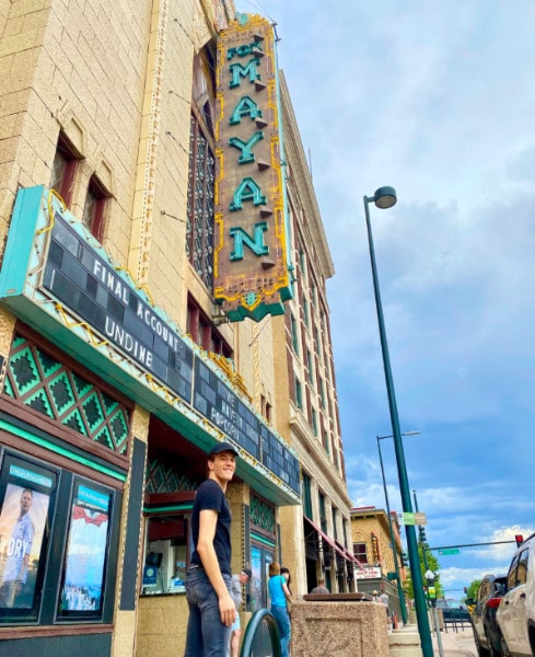 The author standing in front of The Mayan Theatre