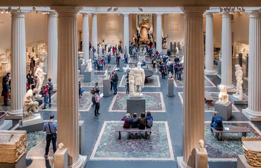 People admiring the arts displayed inside the The Metropolitan Museum of Art