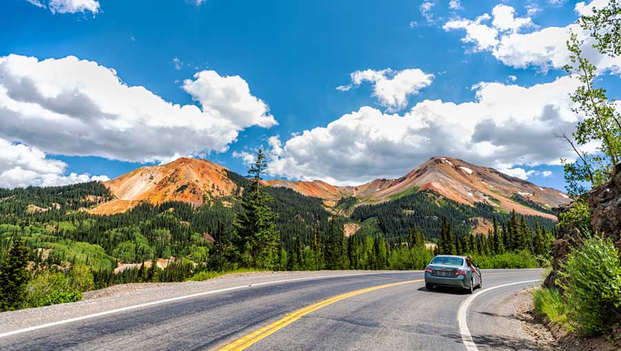 View of a car passing through the Million Dollar Highway